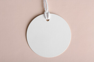 Neutral round gift tag mockup on beige background, minimal design, label tag mockup, Wedding favor...
