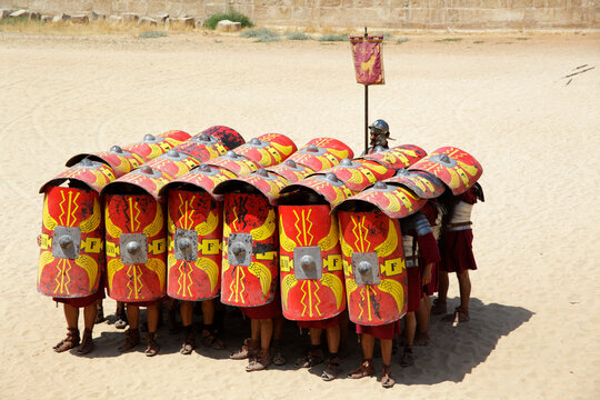 Actors playing roman legionaries soldiers in the tortoise tactic, Jerash, Jordan