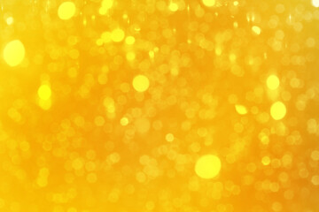 Bright yellow sparkling glitter bokeh background, abstract defocused lights texture © MariiaDemchenko