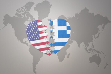 puzzle heart with the national flag of united states of america and greece on a world map...
