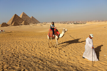 Camel riding at Pyramid complex at Giza, Egypt