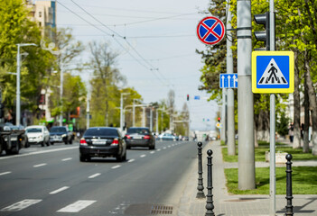 Road sign that means crosswalk. Warning sign to be careful with people crossing the road. Or there are always people crossing