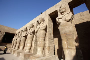 Deurstickers Osirian statues at temple of Pharaoh Ramses III, Karnak Temple Complex, Luxor, Egypt © Massimo Pizzotti