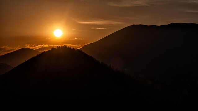 Mountains silhouette against the sunrise. The Low Tatras, Slovakia.