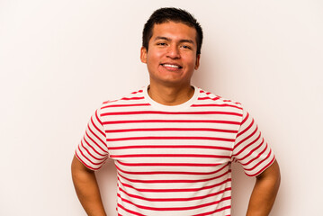 Young hispanic man isolated on white background happy, smiling and cheerful.
