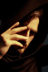 Naklejka premium secretive person in black