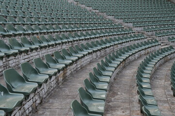 Obraz premium Rows of empty plastic chairs for open-air theater audiences