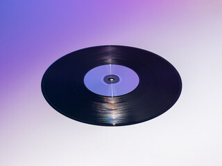 Vinyl record and compact disc on gradient background. Retrowave 80s, 90s concept. Retro futuristic wave.