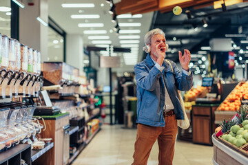 Mature man shopping in a grocery store