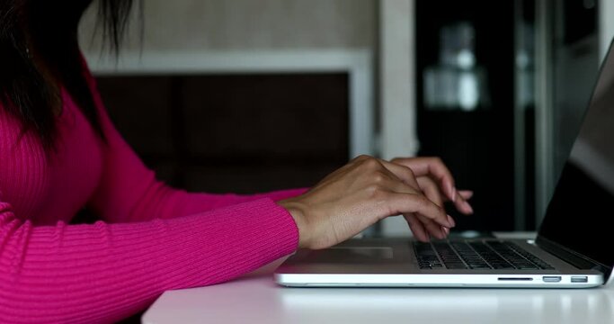 Female hands of business woman professional user worker using typing on laptop notebook keyboard sit at home.