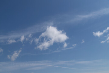 Blue sky cirrus clouds.