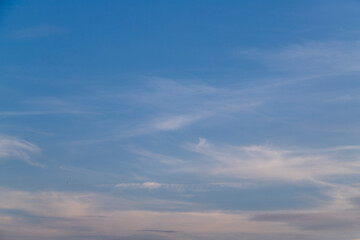 Blue sky cirrus clouds.