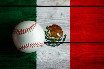 Leather Baseball on Rustic Wooden Background Painted With Mexican Flag