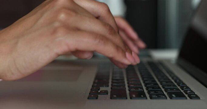 Female hands of business woman professional user worker using typing on laptop notebook keyboard sit at home.