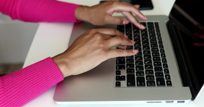 Female hands of business woman professional user worker using typing on laptop notebook keyboard sit at home.