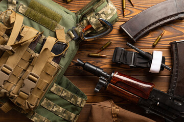 Army body armor, helmet and ammunition, Kalashnikov assault rifle with matrons and first aid...