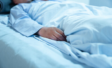 Obraz na płótnie Canvas In the Hospital Sick Male on the Bed