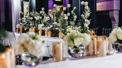 tableware Glasses, flower fork, knife served for dinner in restaurant with cozy interior