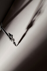 Compass is geometric tool on dark background. crisis and hardship, conflict,metaphor concept. risk...