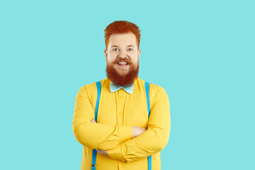 Happy plus size male fashion model in trendy outfit. Funny smiling joyful fat man with ginger beard...