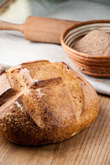 Bread. Baked bread. Craft bakery. Sliced bread on a wooden background. Food blog, food, pastries, flour, hot, fragrant, morning, fresh bread