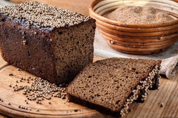Bread. Baked bread. Craft bakery. Sliced bread on a wooden background. Food blog, food, pastries, flour, hot, fragrant, morning, fresh bread
