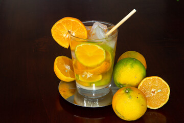 Typical Brazilian caipirinha drink with lemon and sugar cane cachaça