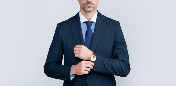 mature boss in formal suit with glasses and wristwatch