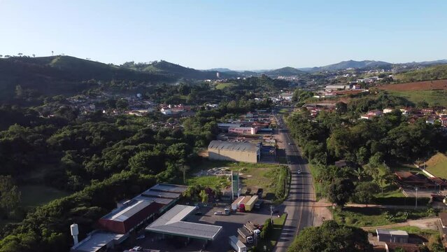 small city in the interior of S&atilde;o Paulo with beautiful mountains in the countryside - Socorro - farms, road - top drone view