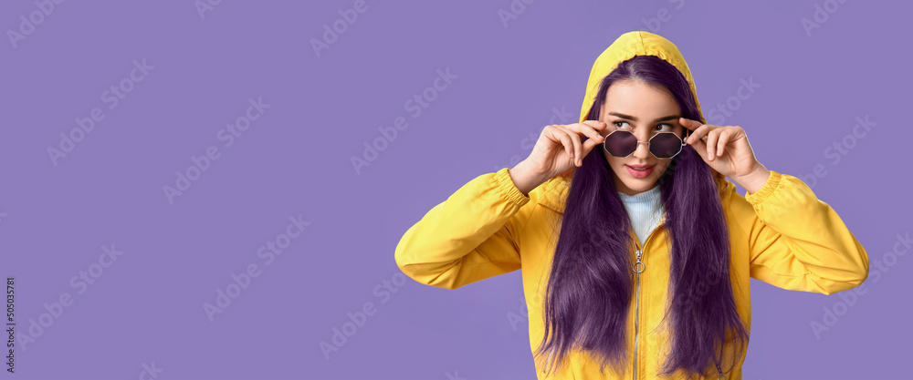 Sticker Beautiful young woman with unusual hair on violet background with space for text