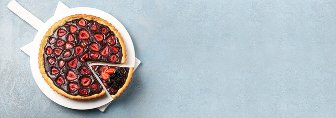 Tasty chocolate strawberry cake on grey background with space for text