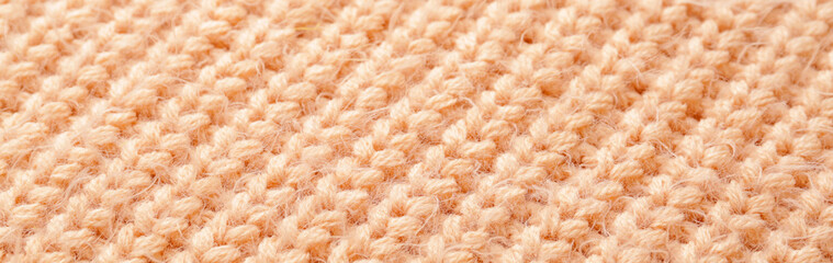 Texture of knitted fabric as background, closeup. Banner for design