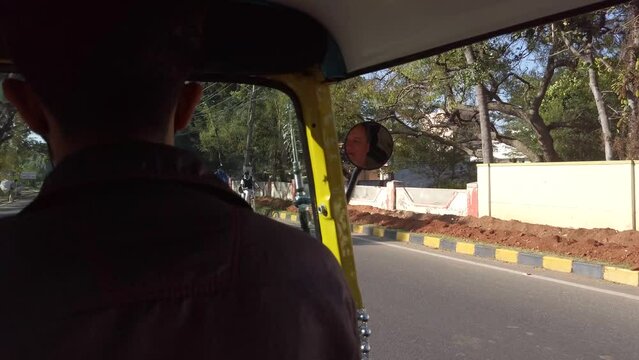 Travelling through the city of Mysore, India, on board a Tuk Tuk