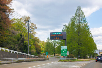 Japan's Northeastern Expressway with a sign in traffic jam. - obrazy, fototapety, plakaty