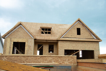 large two story family home under construction
