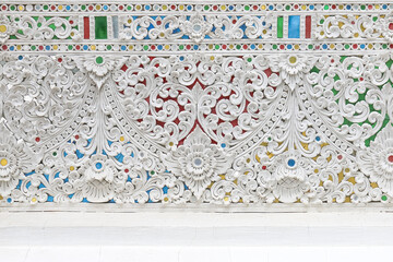 The White stucco , thai style on the temple Wall texture background