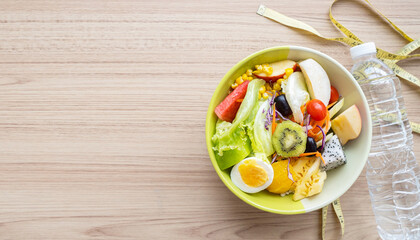 Fresh vegetable salad and healthy food with fruit, vegetables, pulses, herbs. High in anthocyanins, antioxidants, smart, minerals and vitamins for women diet slimming. Health food Concept.