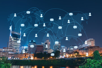 Panoramic view of Broadway district of Nashville over Cumberland River at illuminated night skyline, Tennessee, USA. Social media icons. The concept of networking and establishing people connections