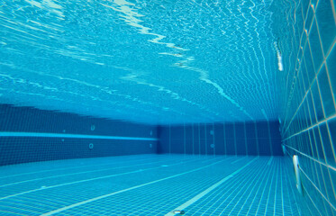 underwater photo of the swimming pool Blue swimming pool for activities, exercise and health care with swimming sports.