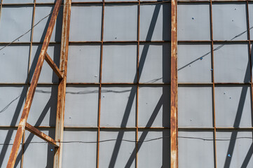 Abandoned Drive-In Movie Theater Screen. The back side of the projection screen. High metal construction. Selective focus.