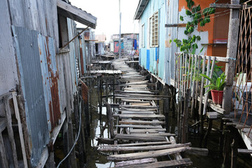 A rustic stilt village of Kampung Tinosan in Sandakan during low tide time.