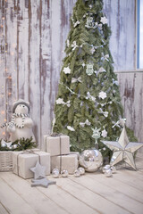 Christmas tree decor in Scandinavian style made of natural fir branches.