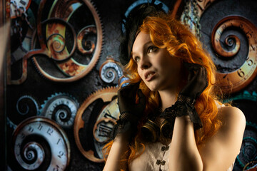 Portrait of a beautiful girl with red hair in a steampunk suit 