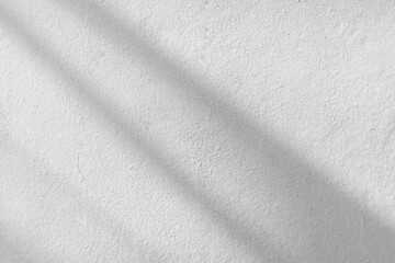 Sunlight shadow on abstract white concrete cement wall background texture