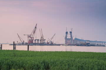 Fototapeta premium Yangtze River Bridge and Yangtze River scenery under construction in Suzhou, China