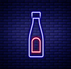 Glowing neon line Bottle of water icon isolated on brick wall background. Soda aqua drink sign. Colorful outline concept. Vector