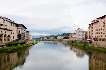 View of Arno river and Ponte alle Grazie in Florence city, Italy