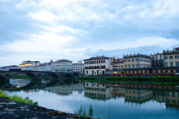 Fototapeta na wymiar Florence skyline with Ponte alla Carraia bridge over Arno river in Italy