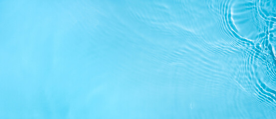 Transparent blue clear water wave surface texture with splashes and bubbles. Abstract summer banner...