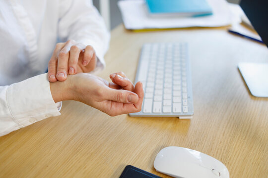 Closeup View Of Business Woman's Hands Measuring Her Hearth Rate